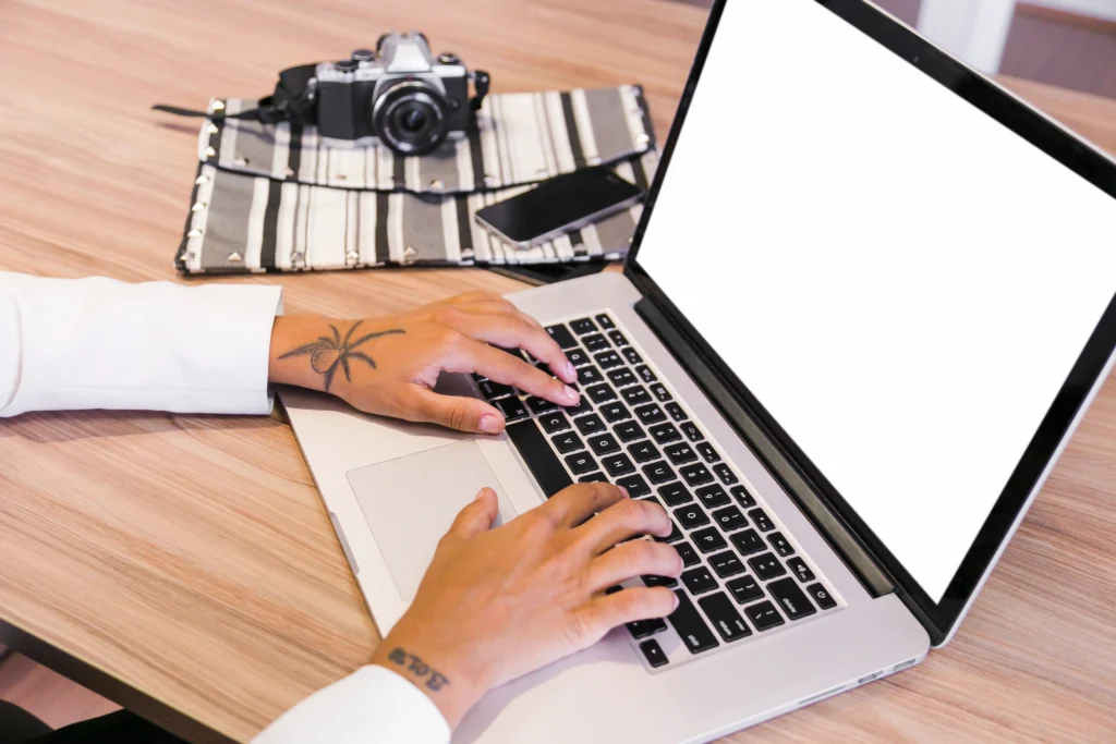 SEO Services In Kamla Nagar working on laptop