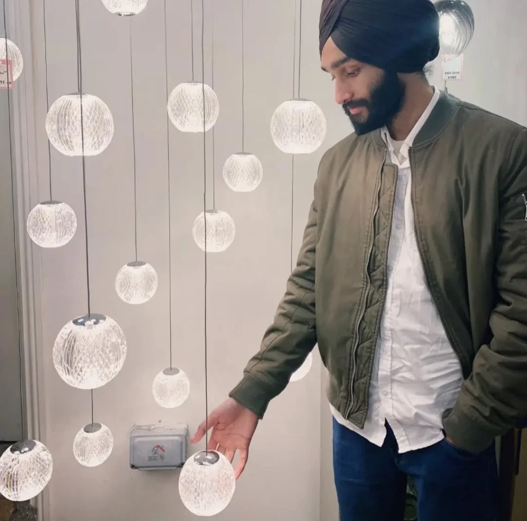 SEO expert in kamla nagar standing at clickpixo head office with lights.