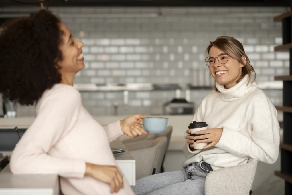 Two girls drinking coffee at seo expert in karol bagh